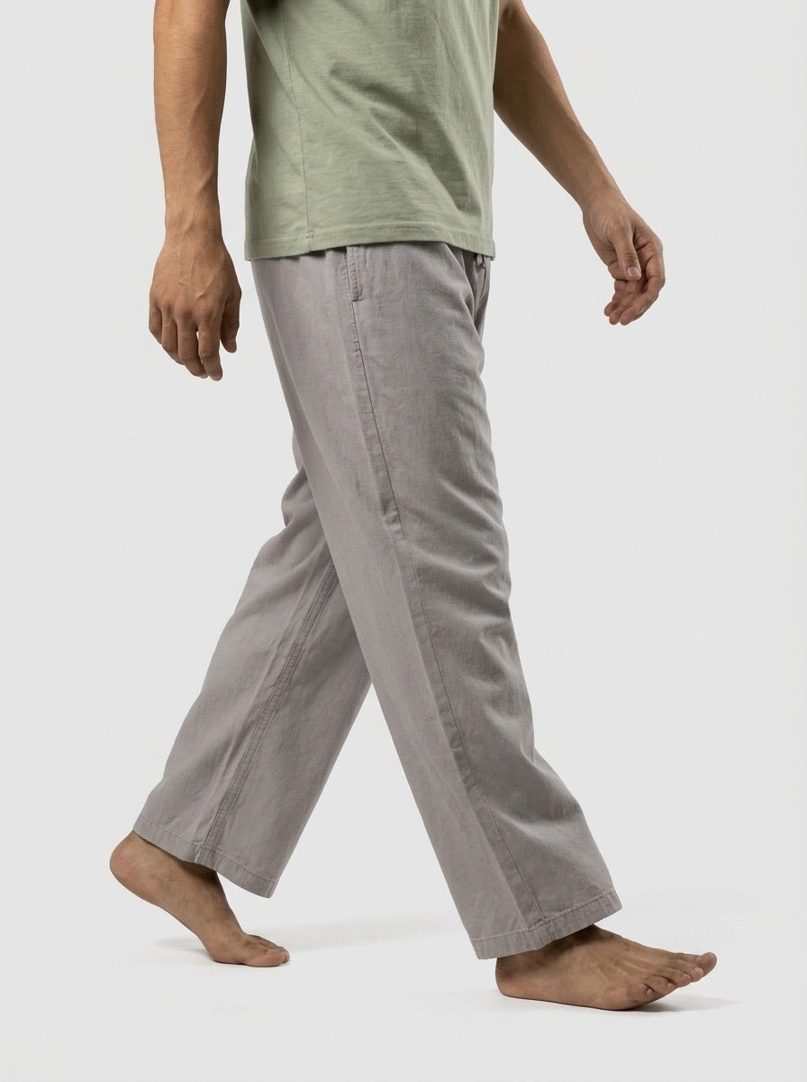 Linen trouser draping mid-stride
