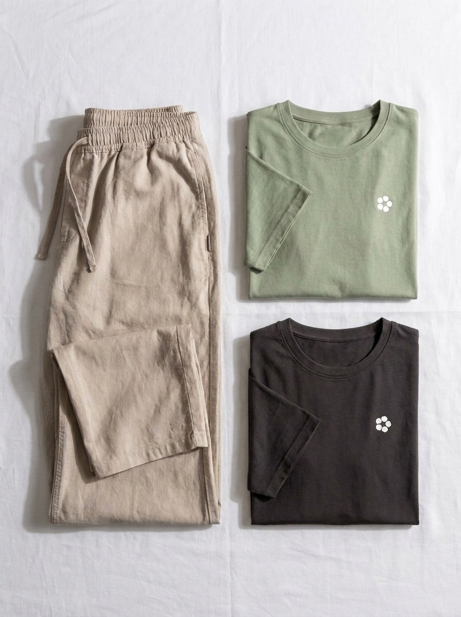 Linen trouser laid flat with two AeroCotton tees