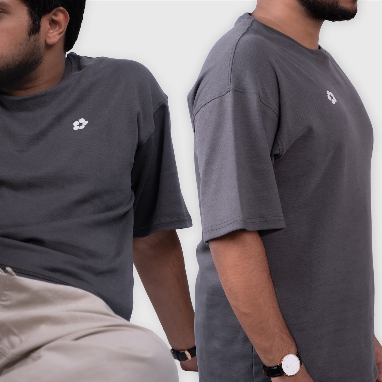 Man wearing Comfiq Sand Linen Trousers sitting relaxed