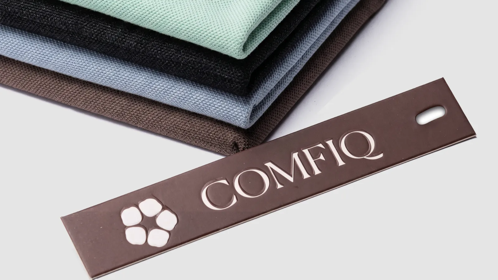 Folded natural fabrics with a COMFIQ tag